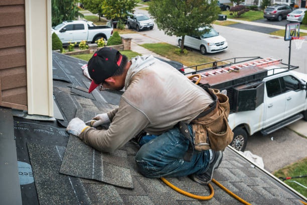 Professional Gutter Repair And Installation technician working in Westhampton Beach, NY